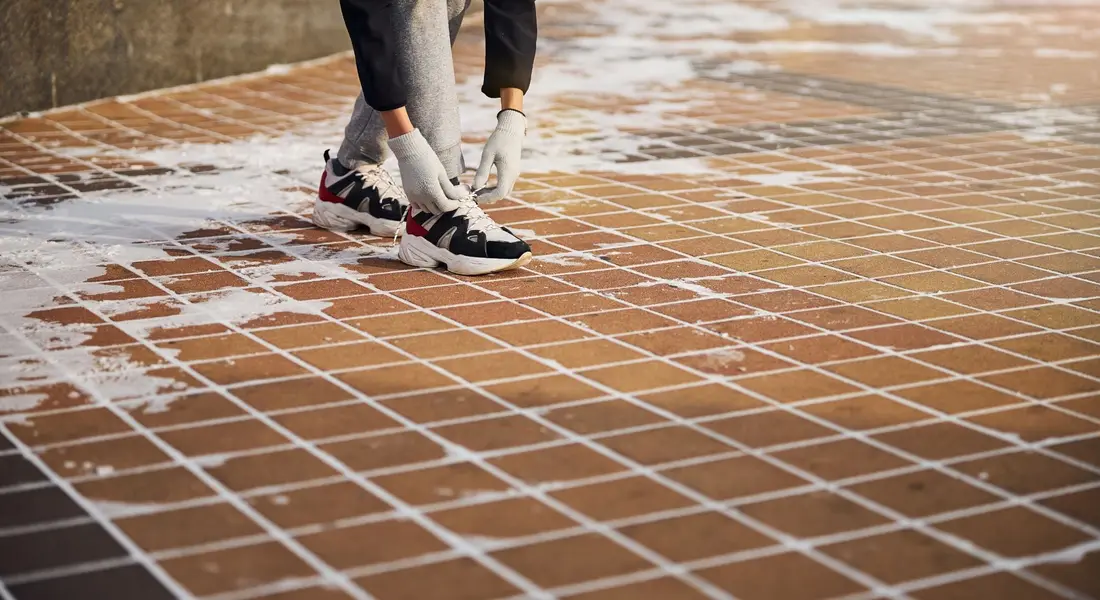 White powdery efflorescence residue on a concrete surface