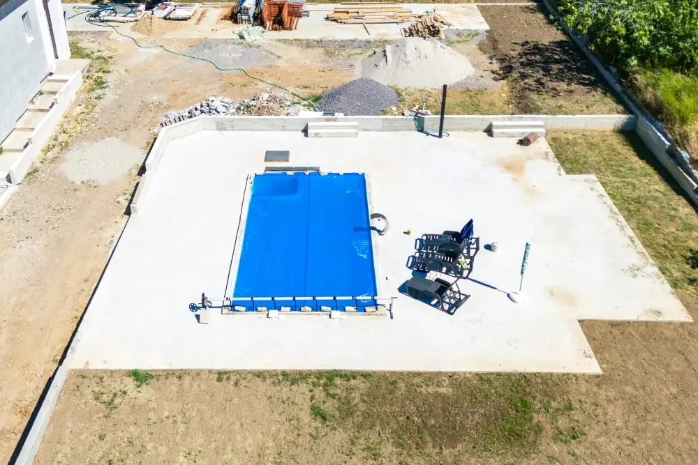 A honed concrete pool surround with a smooth matte finish