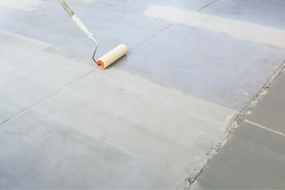 A freshly poured concrete garage slab ready for use