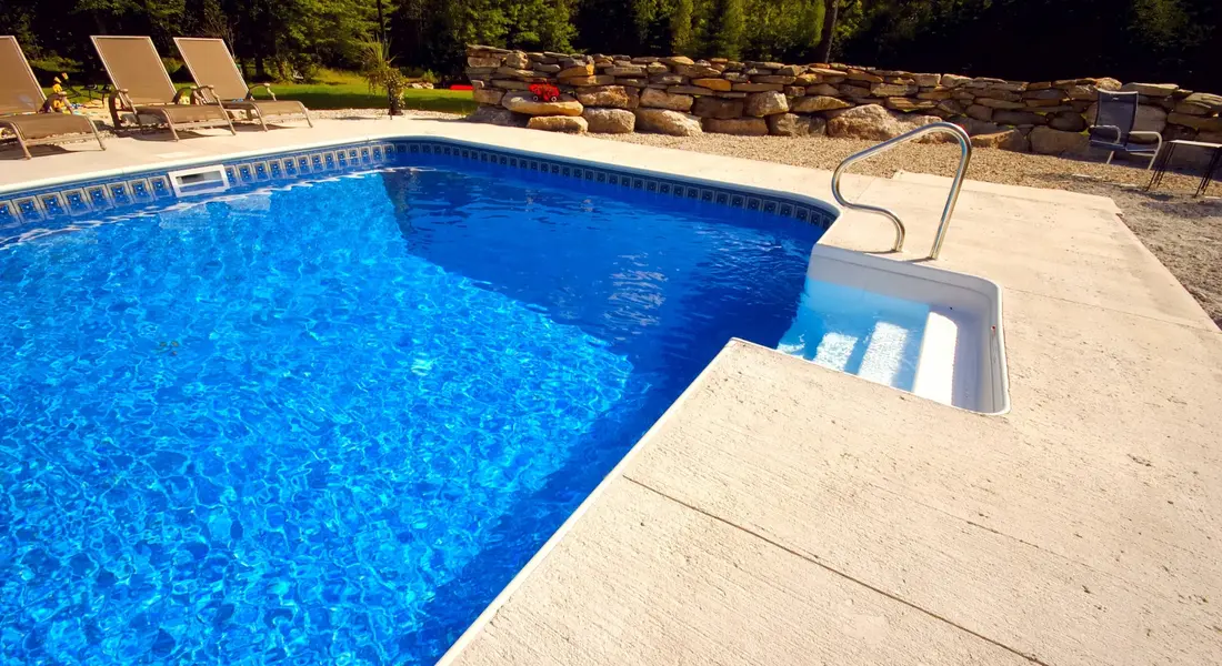 Decorative concrete finish around a residential pool surround