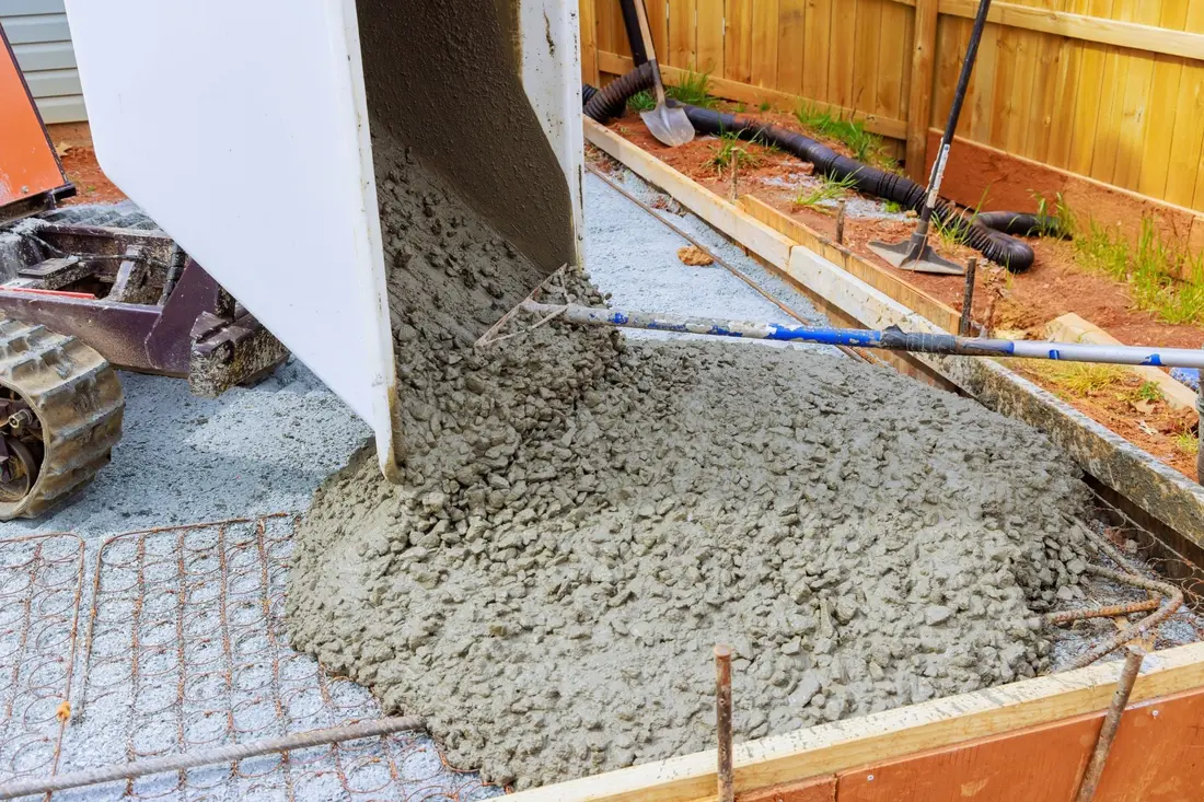 Concrete being mixed and tested on site for a mix design review