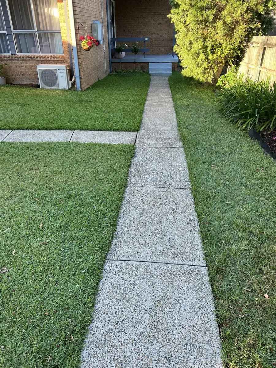 An exposed aggregate concrete pathway