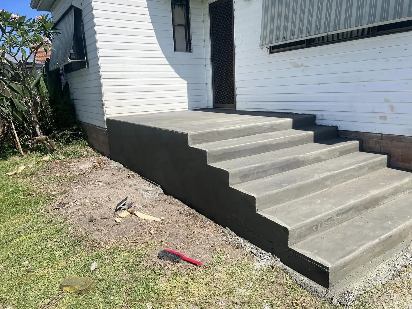 Repaired and resurfaced concrete steps